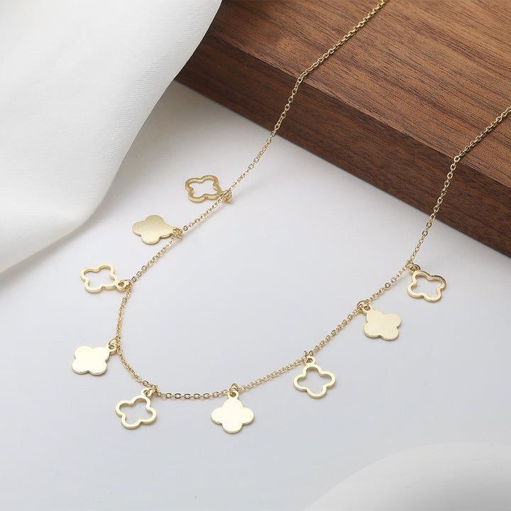 Halskette 925 Sterlingsilber 14K vergoldet mit Kleeblattanhängern auf Deko