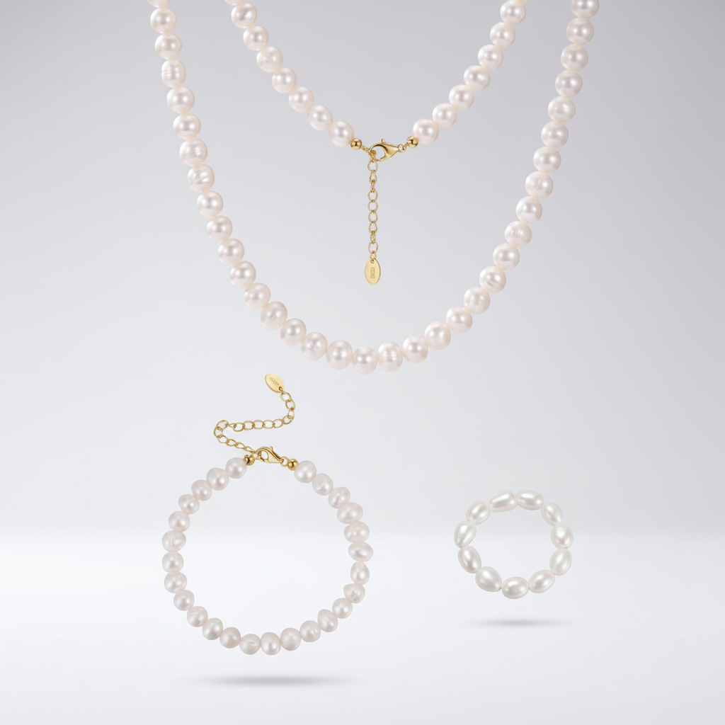 Maréa Perlenschmuck-Set: Kette, Armband und Ring aus Süßwasserperlen, freigestellt